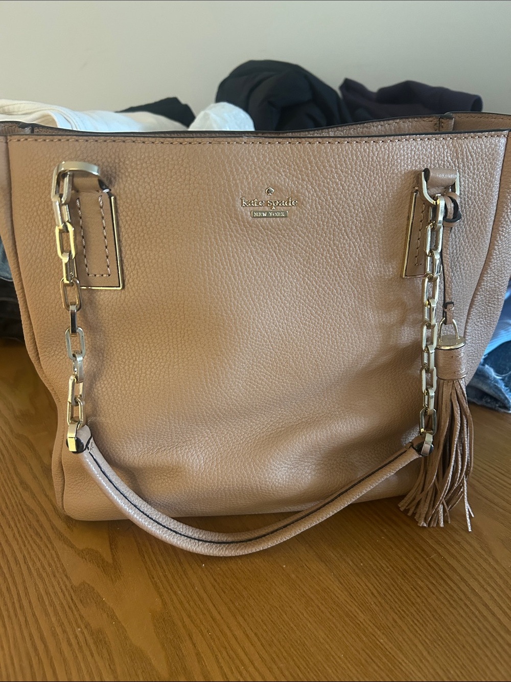 kate spade tan pebble leather tote with gold chain and tassel